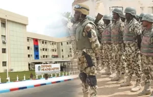 DEFENCE HEADQUARTERS DECLARES PROFESSOR, A WOMAN 6 OTHERS WANTED